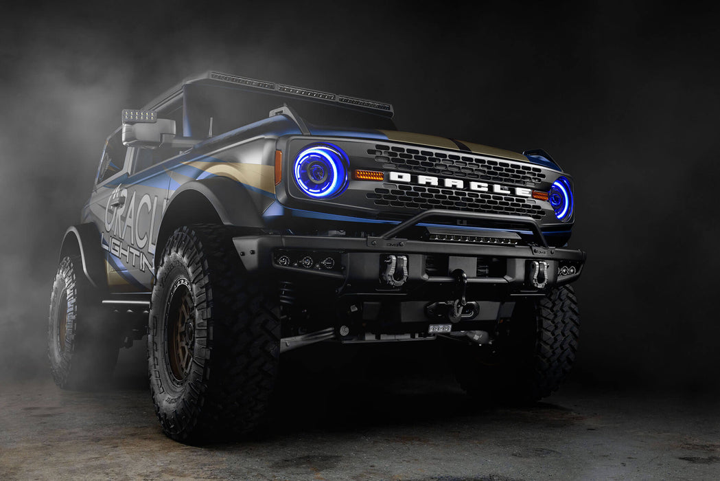 Three quarters view of Ford Bronco with Oculus™ ColorSHIFT® Bi-LED Projector Headlights installed with blue halos on
