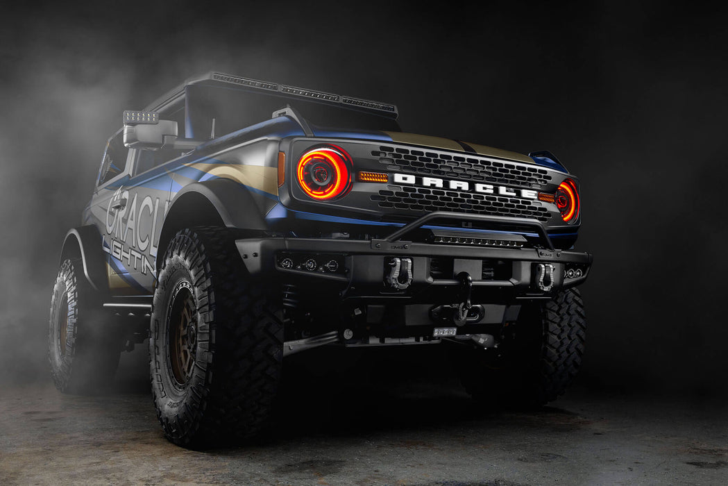 Three quarters view of Ford Bronco with Oculus™ ColorSHIFT® Bi-LED Projector Headlights and red halos turned on