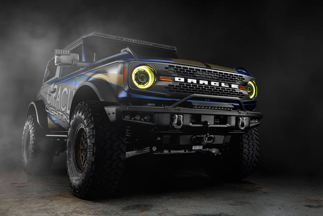 Three quarters view of Ford Bronco with Oculus™ ColorSHIFT® Bi-LED Projector Headlights installed and yellow halos turned on