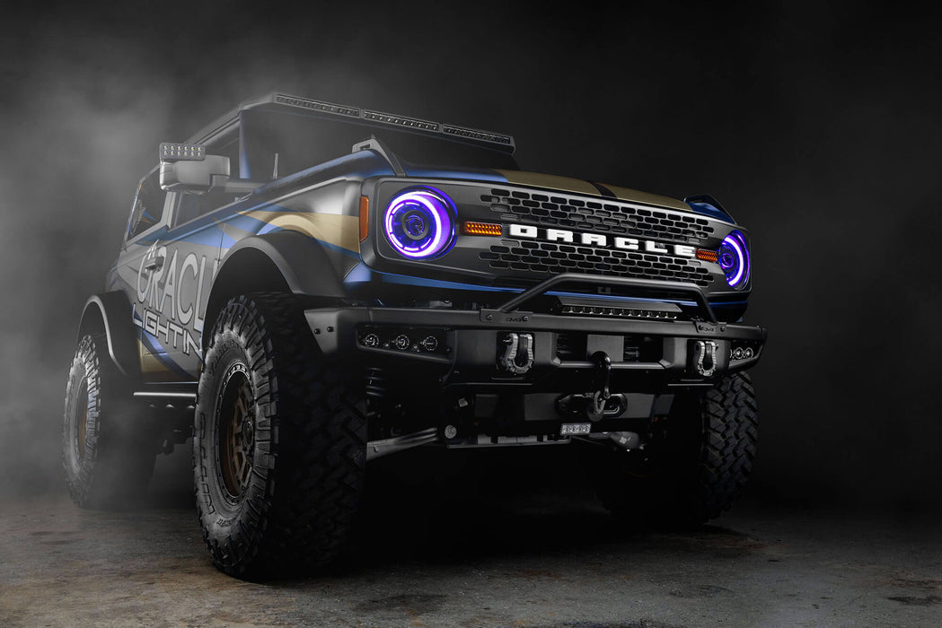 Three quarters view of Ford Bronco with Oculus™ ColorSHIFT® Bi-LED Projector Headlights installed and purple halos turned on