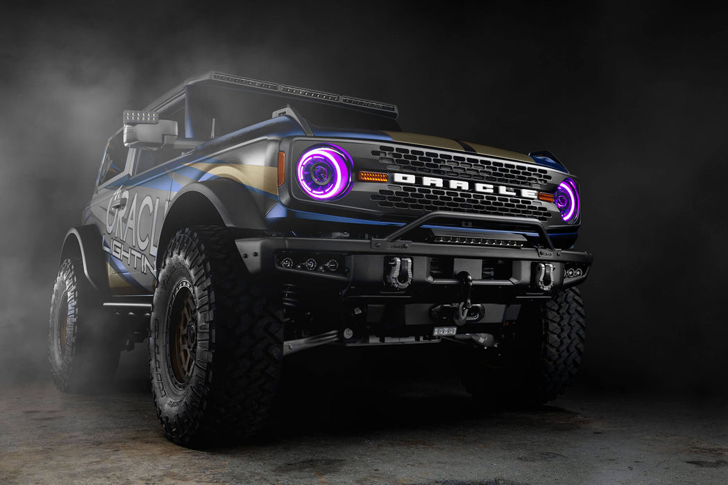 Three quarters view of Ford Bronco with Oculus™ ColorSHIFT® Bi-LED Projector Headlights installed and pink halos turned on