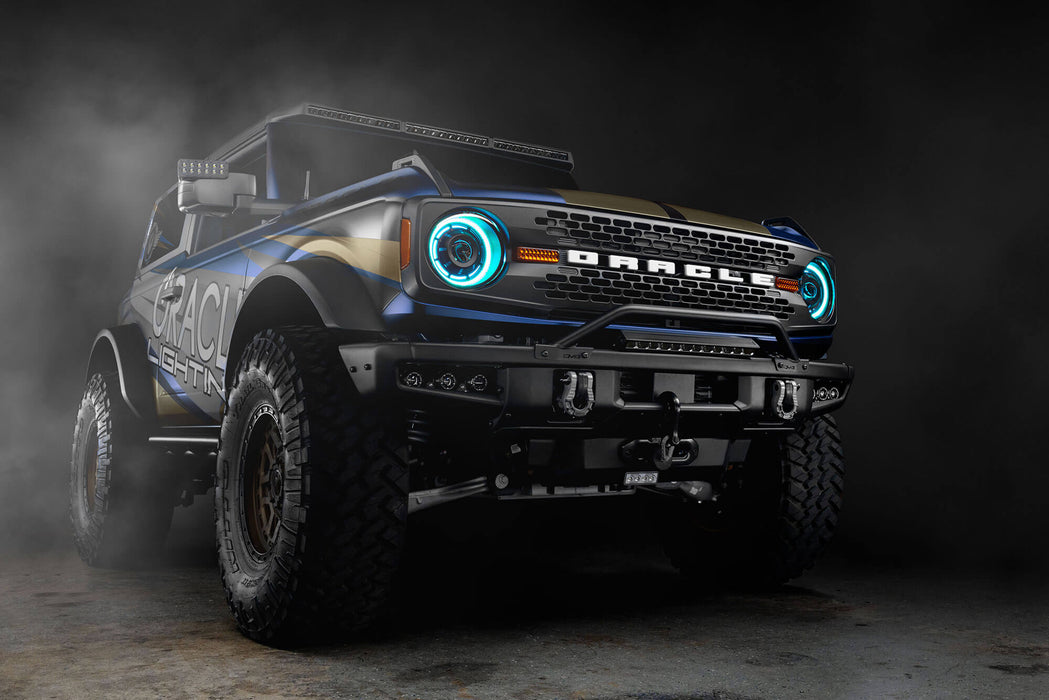 Three quarters view of Ford Bronco with Oculus™ ColorSHIFT® Bi-LED Projector Headlights installed and cyan halos turned on