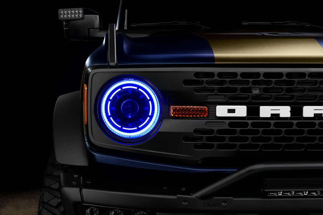 Close up view of Oculus™ ColorSHIFT® Bi-LED Projector Headlights installed on Ford Bronco with blue LEDs