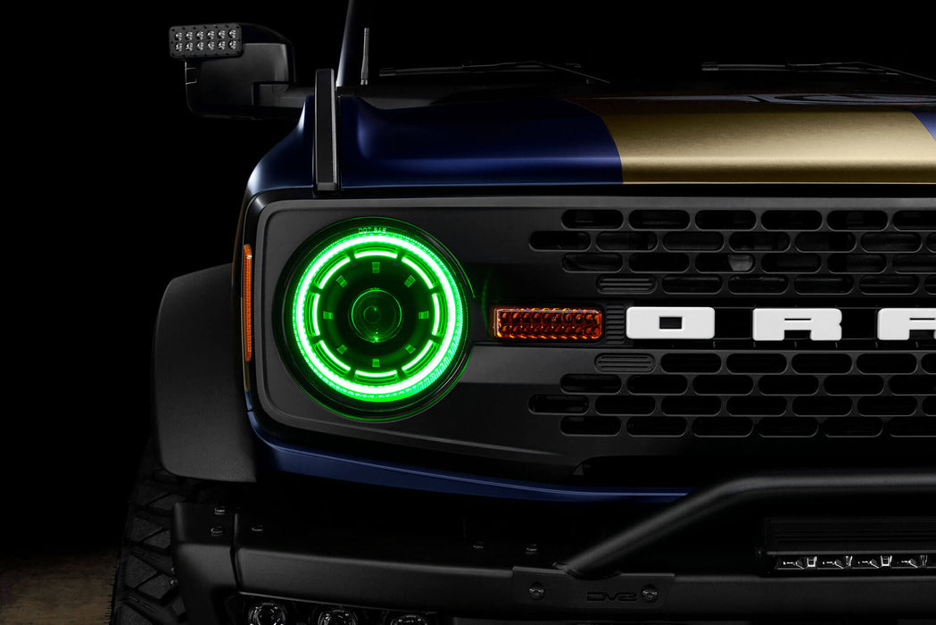 Close up view of Oculus™ ColorSHIFT® Bi-LED Projector Headlights installed on Ford Bronco with green LEDs