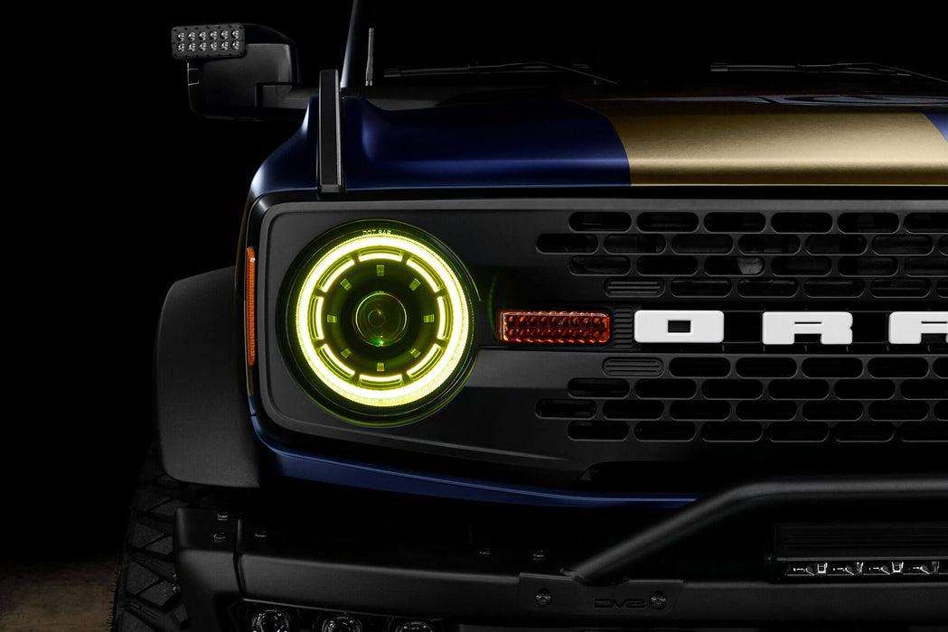 Close up view of Oculus™ ColorSHIFT® Bi-LED Projector Headlights installed on Ford Bronco with yellow LEDs