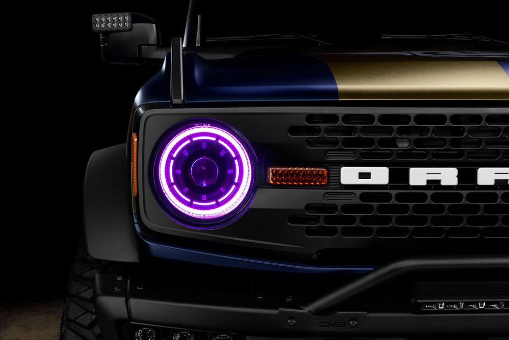 Close up view of Oculus™ ColorSHIFT® Bi-LED Projector Headlights installed on Ford Bronco with purple LEDs