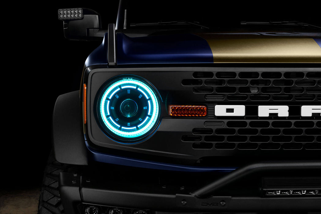 Close up view of Oculus™ ColorSHIFT® Bi-LED Projector Headlights installed on Ford Bronco with cyan LEDs