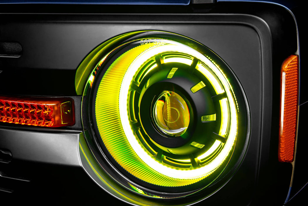 Extreme close up view of Oculus™ ColorSHIFT® Bi-LED Projector Headlights installed with yellow LEDs