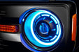 Extreme close up view of Oculus™ ColorSHIFT® Bi-LED Projector Headlights installed with cyan LEDs