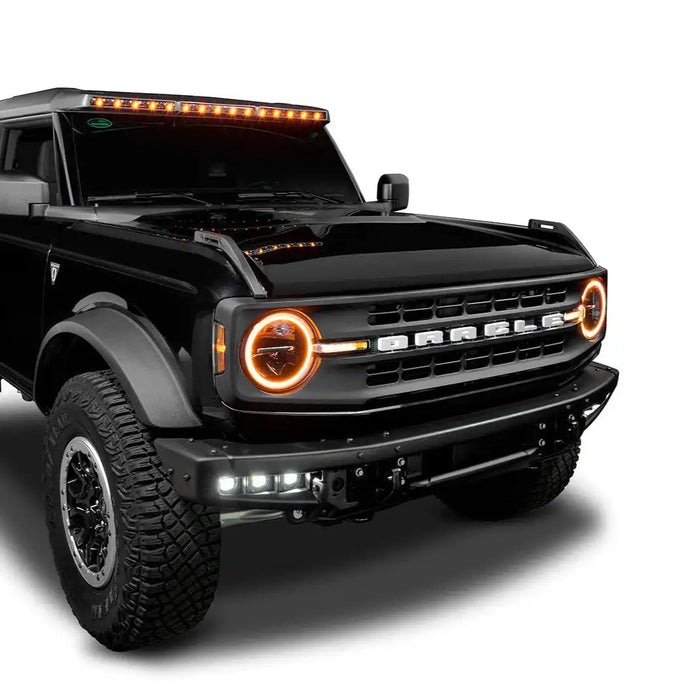 Studio shot of a black Ford Bronco equipped with the Integrated Windshield Roof LED Light Bar System.