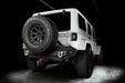 Rear three quarters view of a Jeep Wrangler JK with tinted flush mount tail lights