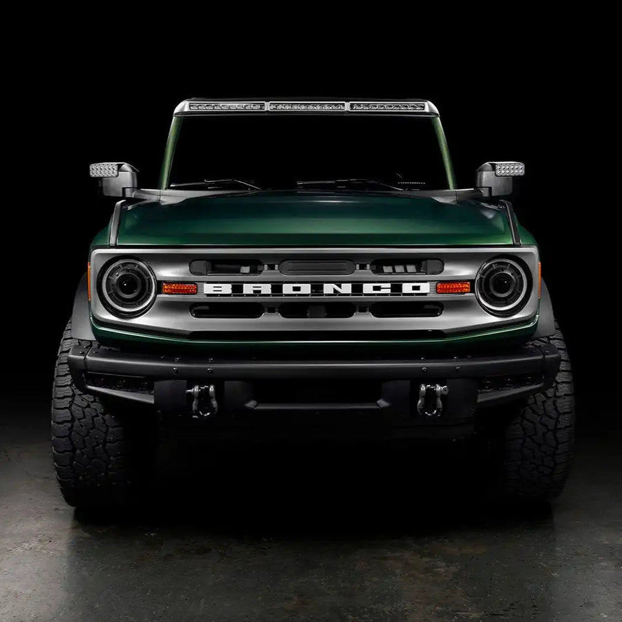 Front view of a green Ford Bronco with LED Off-Road Side Mirrors installed.