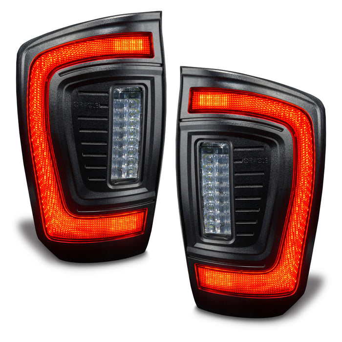 Angled view of Flush Style LED Tail Lights for 2016-2023 Gen 3 Toyota Tacoma with running lights on