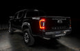 Rear view of black Toyota Tacoma with Flush Style LED Tail Lights installed and brake lights on