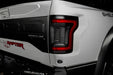 Close up of Flush Style LED Tail Lights installed on white Ford Raptor