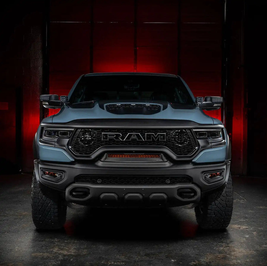 Straight front view of a RAM TRX with LED Off-Road Side Mirror Ditch Lights installed