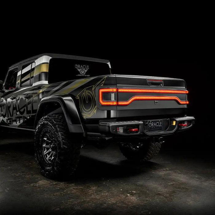 Three quarters view of Jeep Gladiator JT with Racetrack Tailgate DRL on