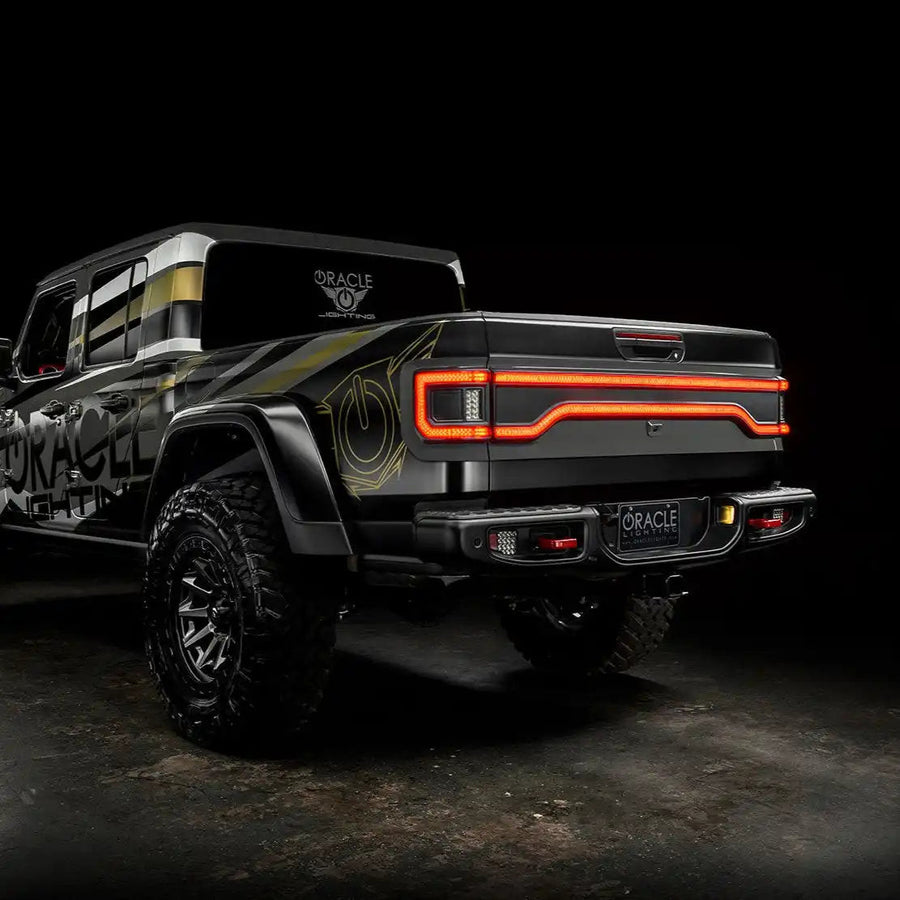 Three quarters view of Jeep Gladiator JT with Racetrack Tailgate DRL on