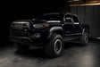 Front three quarters view of black toyota tacoma with LED Off-Road Side Mirror Ditch Lights installed