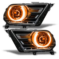 Ford Mustang headlights with amber LED halo rings.