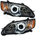 Subaru Legacy Headlights with white halos.