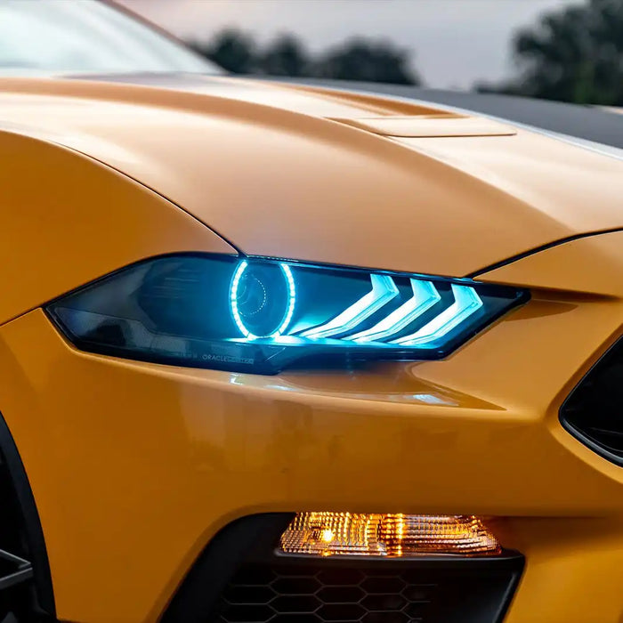 Close-up of a Ford Mustang headlight with white LEDs.
