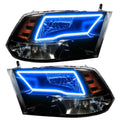 2009-2018 RAM ColorSHIFT Switchback Quad Pre-Assembled Halo Headlights - Black Housing with blue halos.