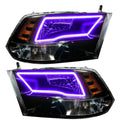 2009-2018 RAM ColorSHIFT Switchback Quad Pre-Assembled Halo Headlights - Black Housing with purple halos.