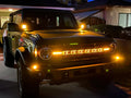 Ford Bronco with amber orange LED letter badges installed