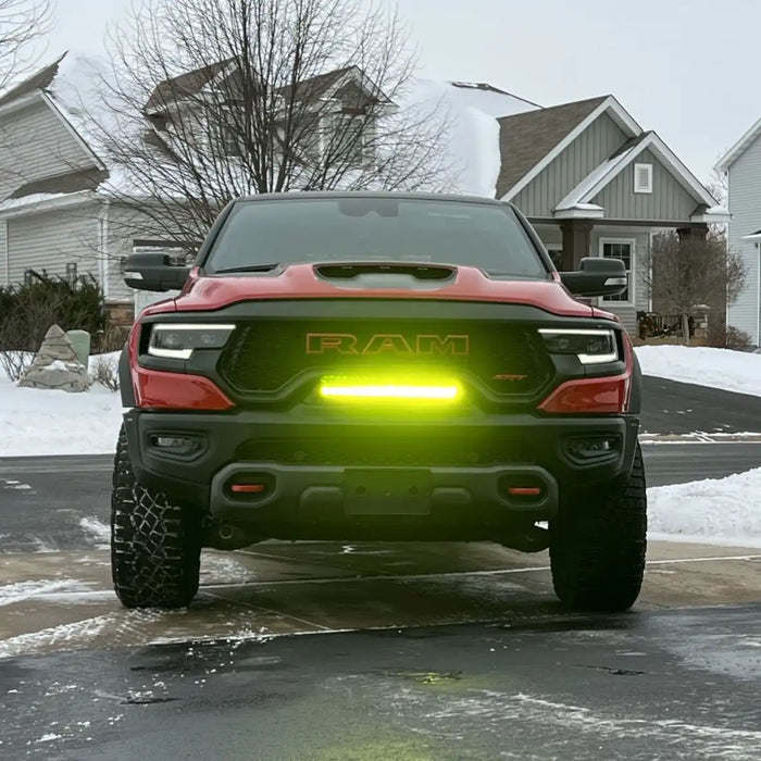 Front end of a RAM TRX with Front Bumper Flush LED Light Bar System installed.