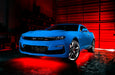 Blue Camaro with red LED underglow.