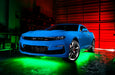 Blue Camaro with green LED underglow.