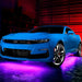 Blue Camaro with pink LED underglow.