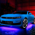 Blue Camaro with purple LED underglow.