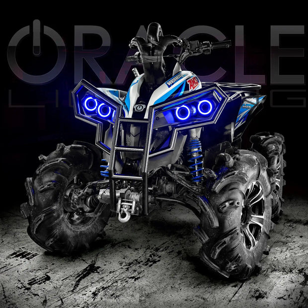 Can-Am Renegade with blue LED Surface Mount Headlight Halos installed.