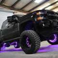 Black truck with purple LED wheel rings.