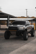 Three quarters view of a truck with a RFT lightbar installed on the grill