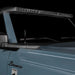 Close-up of a grey Ford Bronco with the Integrated Windshield Roof LED Light Bar System installed.
