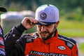 Man wearing ORACLE Lighting Official Snap-Back Hat