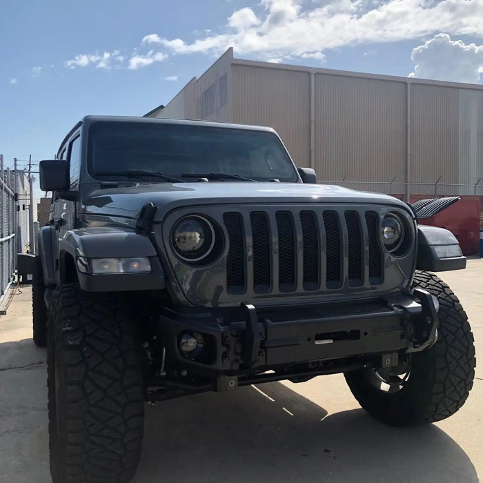 Front end of a Jeep with High Performance 20W LED Fog Lights installed.