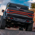 Rear view of a Jeep Gladiator JT equipped with Flush Mount LED Tail Lights and Racetrack LED Tailgate Panel.