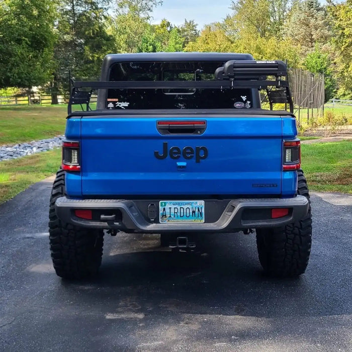 Rear view of a blue Jeep Gladiator JT with Flush Mount LED Tail Lights installed.