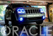 Front end of a Jeep Grand Cherokee with white LED headlight and fog light halos.
