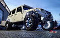 White Jeep with white LED wheel rings.