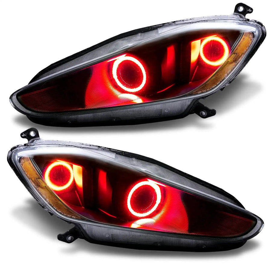 Maserati GranTurismo headlights with red halo rings.