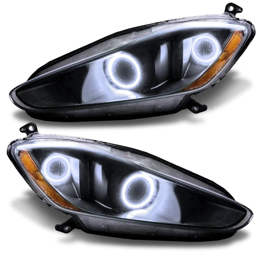 Maserati GranTurismo headlights with white halo rings.