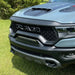 Front end of a RAM TRX with Front Bumper Flush LED Light Bar System installed with white LEDs