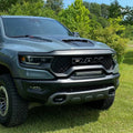 Front end of a RAM TRX with Front Bumper Flush LED Light Bar System installed with white LEDs