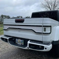 White Jeep Gladiator JT with a white Racetrack Flush Style LED Tailgate Panel Light installed.