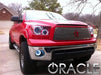 Three quarters view of a Toyota Tundra with white LED headlight halo rings.